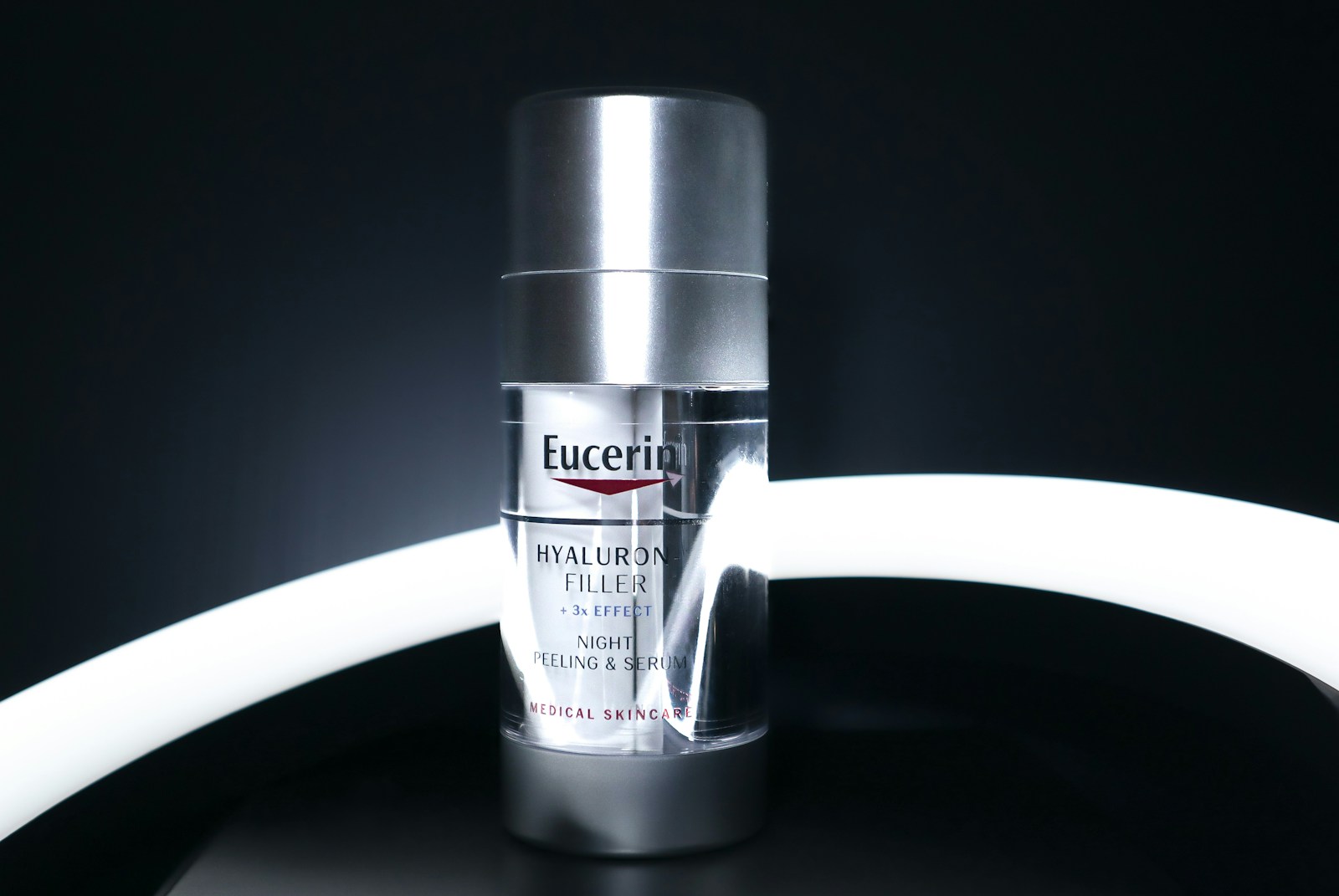 a bottle of eucerin eye cream sitting on a table